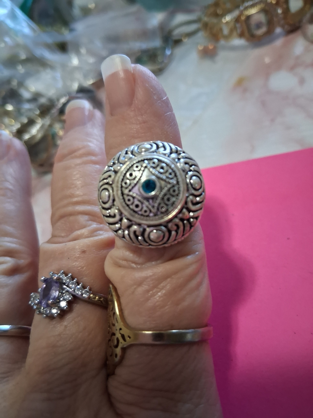 Intricate Silver-Tone Filigree Ring with Blue Accent